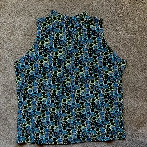 Summery, Sleeveless high neck; gorgeous geometric print.  Soft, liquidy knit